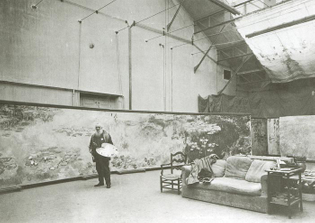 Monet in his third studio in front of Morning, c. 1924-1925.