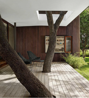 mark-word-design-incorporates-trees-directly-into-the-deck-and-seating-area-at-the-lakeview-residence-in-austin-texas.png