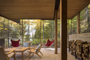 positioned-for-stellar-outdoor-views-the-screened-porch-features-concrete-floors-a-cedar-ceiling-natural-fir-posts-and-midce...